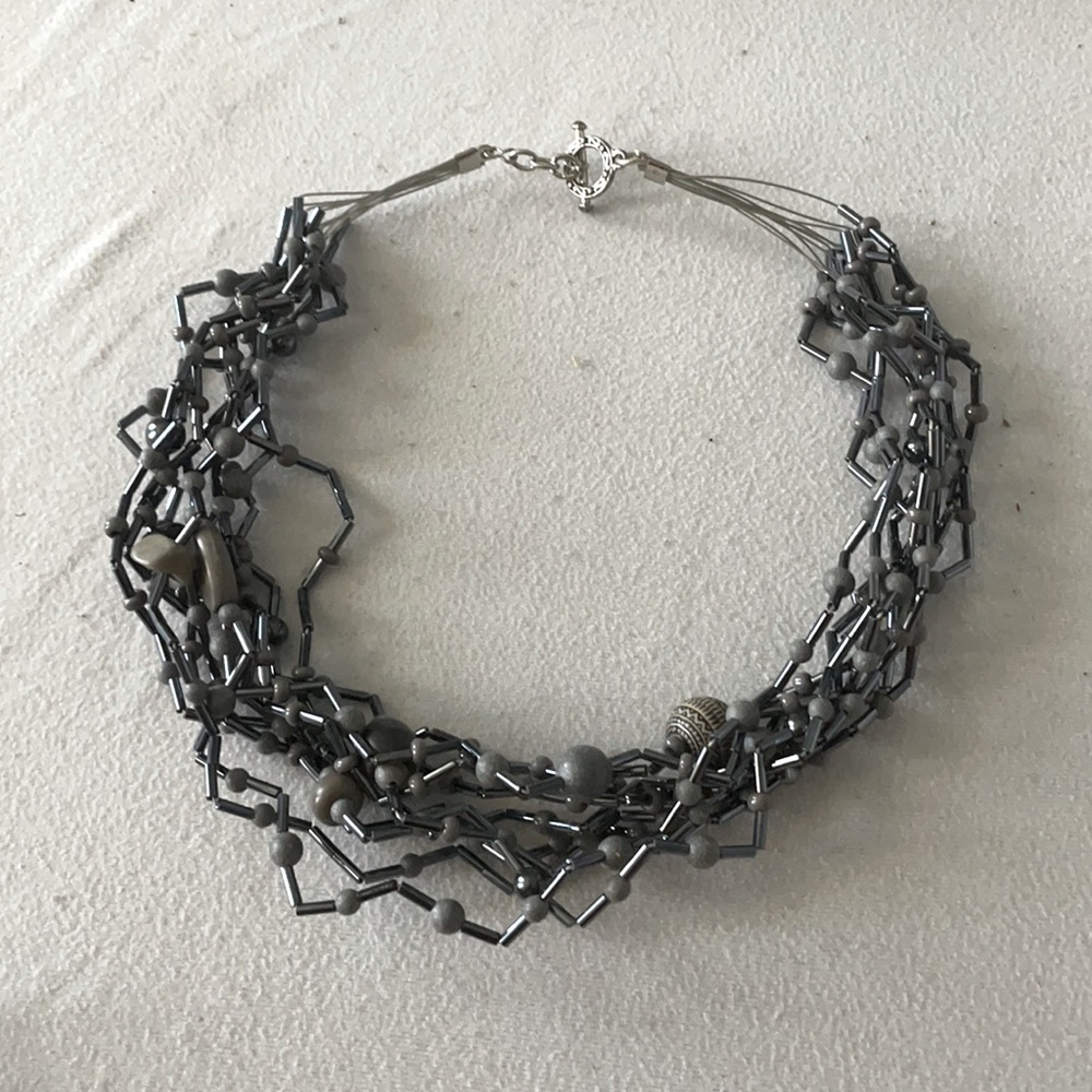 Brand new contemporary grey and charcoal necklace.
